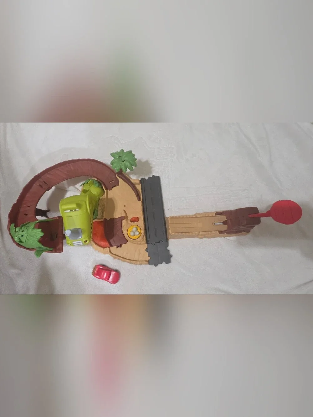 Mattel Disney Pixar Cars,  Dinosaur Playground Playset with Lightning Mcqueen